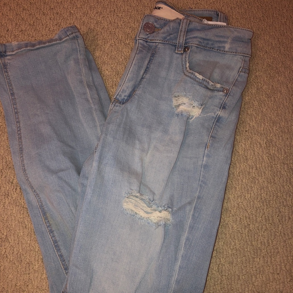 Light wash ripped garage girlfriend jeans